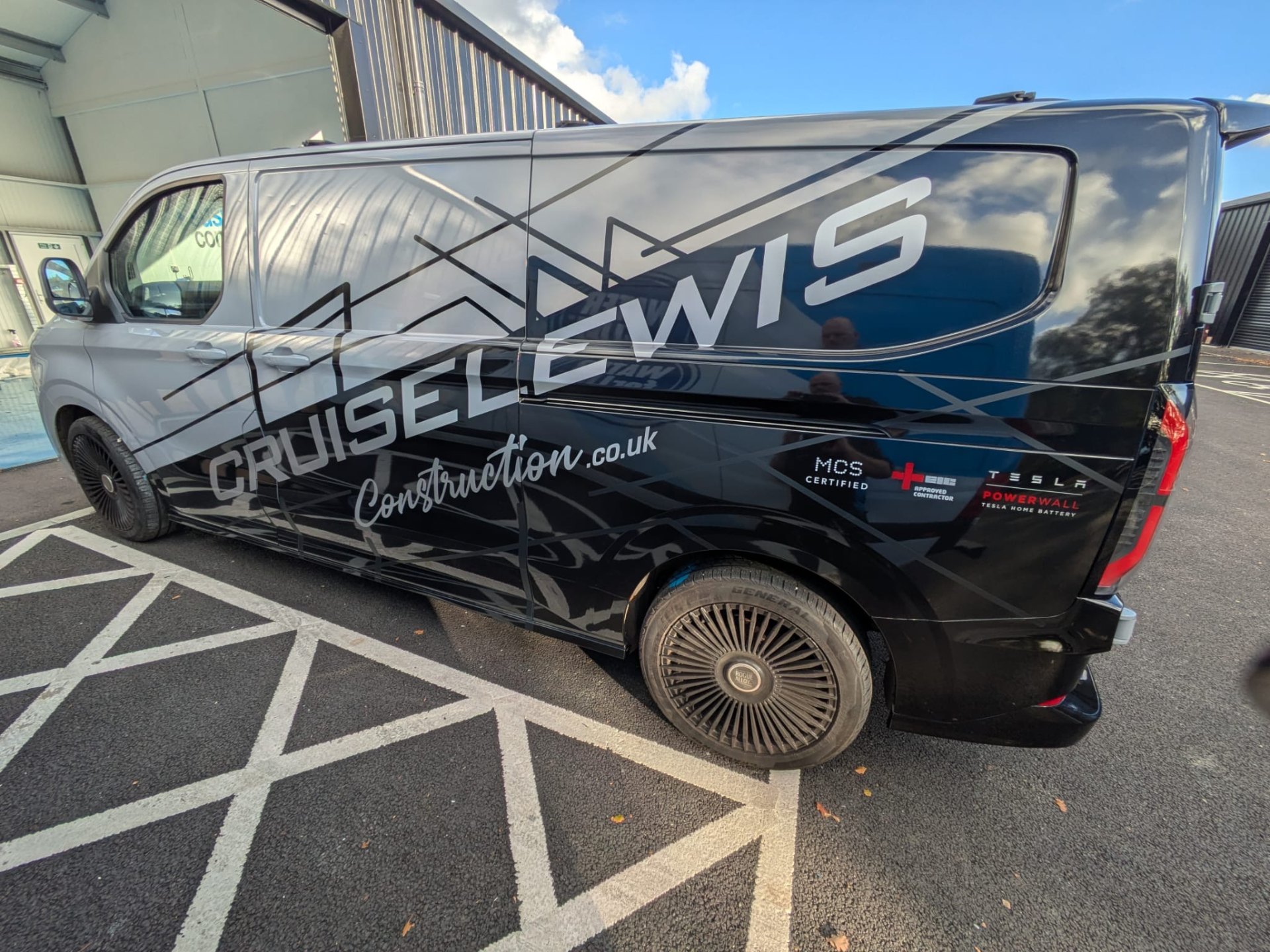 Cruise Lewis Construction van - opposite side