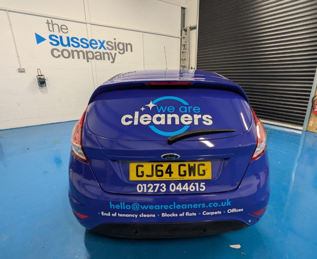 Rear view showing door signage and explainer bullet points